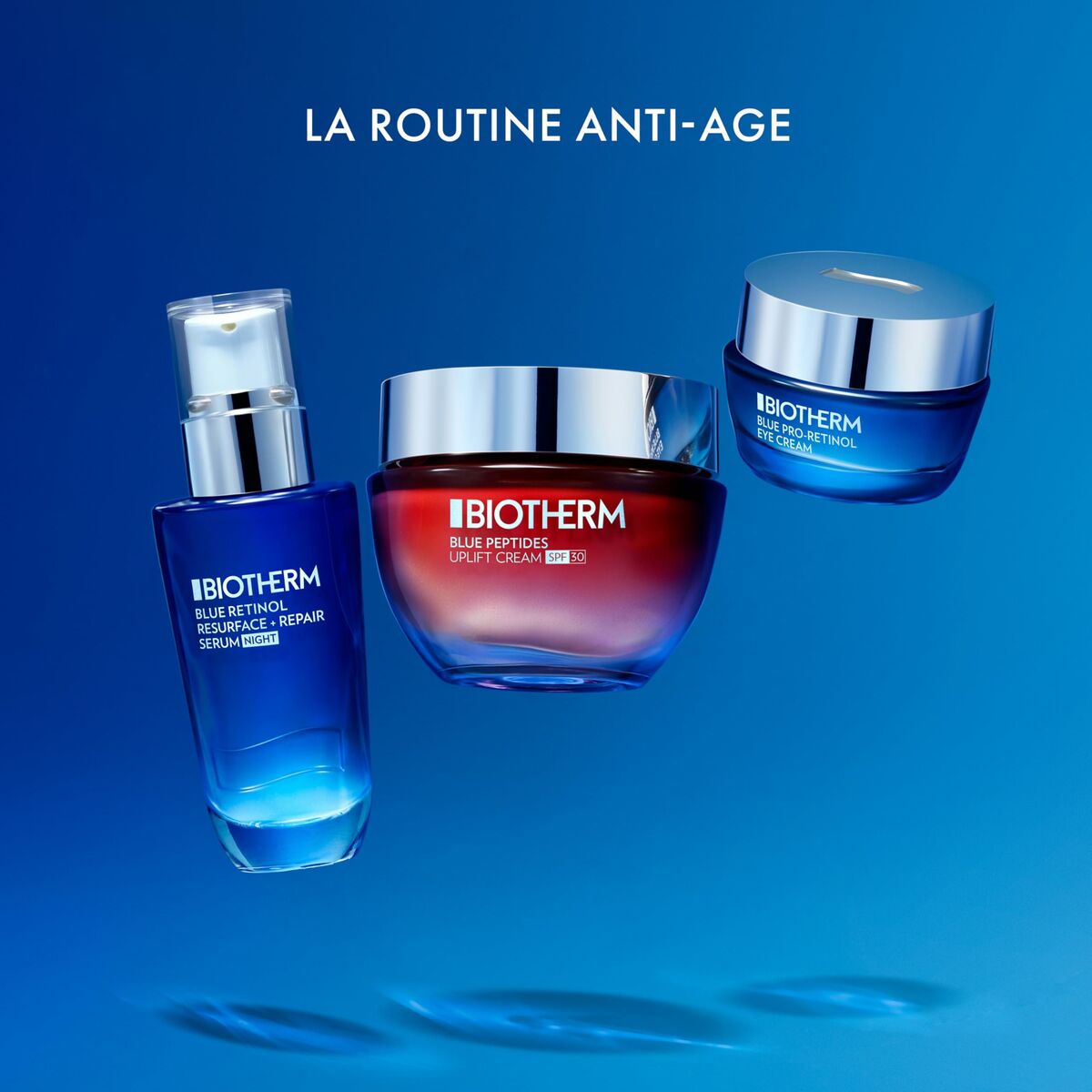 Biotherm anti-aging routine featuring Blue Retinol Repair Serum and Blue Peptides Uplift Cream against a blue background.